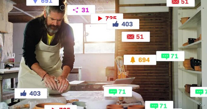 Ceramic artisan kneading clay on pottery bench, showing floating social media marketing icons