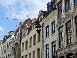 Fototapeta premium Lille, May 2025: Visit the beautiful city of Lille, France.. View of the superb facades of Flemish-style houses 