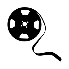 Black and white image of a film reel with trailing ribbon