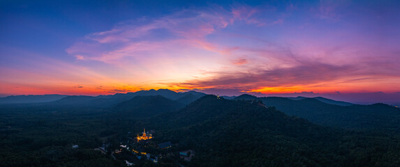 Aerial view of amazing sky in twilight above Phra Yai Wat Phra That Doi Phra Chan (Daibutsu) on the...