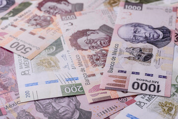 Money, Mexican currency, peso banknotes. Conceptual financial background
