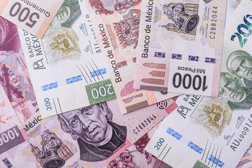 Obraz premium Money, Mexican currency, peso banknotes. Conceptual financial background