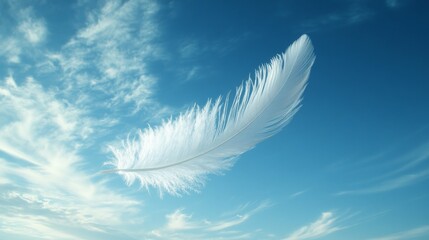 White feather floating softly in the sky with delicate clouds around it.