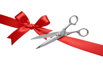 Scissors cutting a red ribbon with bow