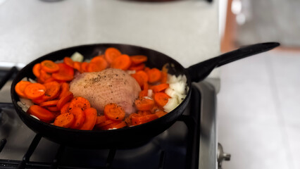 Cooking Ground Meat with Carrots in a Pan for a Delicious and Hearty Dinner Experience