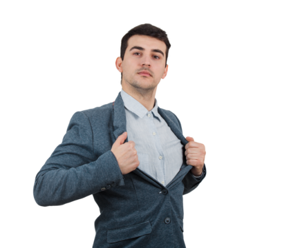 Young businessman acting with courage like a superhero and tearing off his jacket isolated on transparent background
