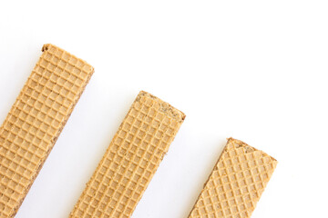 Tasty chocolate wafer biscuits isolated on white background.