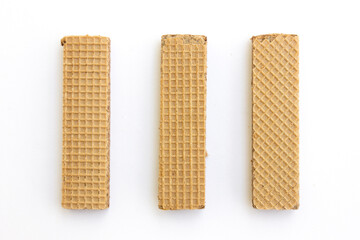Tasty chocolate wafer biscuits isolated on white background.