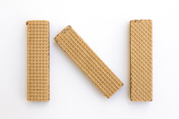 Tasty chocolate wafer biscuits isolated on white background.