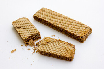 Tasty chocolate wafer biscuits isolated on white background.