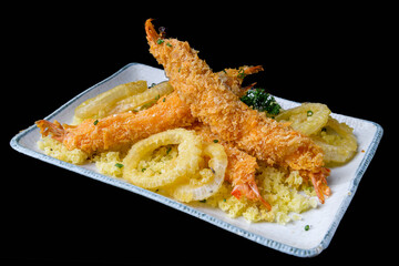 Tempura shrimp and calamari on black background