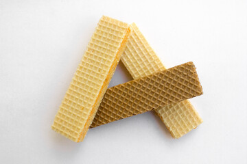 Tasty cheese and chocolated wafer biscuits isolated on white background.