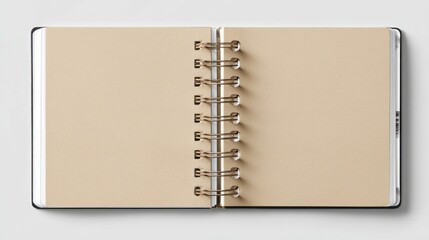 Open spiral-bound notebook with blank beige pages