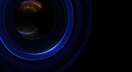 Abstract image featuring blue and orange light rings against a dark background.
