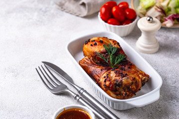 Roasted chicken drumsticks with vegetables