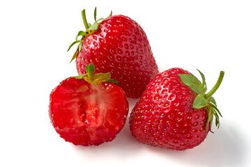 three ripe sweet strawberries isolated on white background