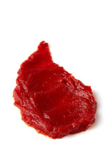 smear of red tomato ketchup isolated on white background
