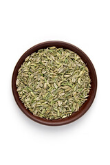 dried fennel seeds in brown clay bowl isolated on white background. top view with copy space