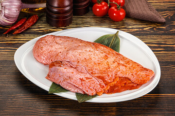 Raw marinated duck breast for cooking