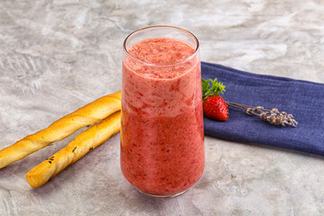 Sweet strawberry smoothie with milk