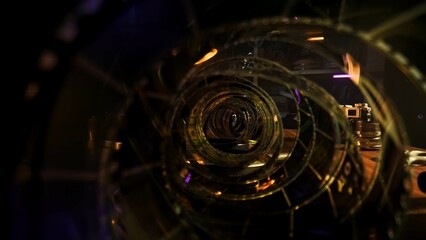 Intricate Spiral of Vintage Film Reels in Dim Lighting