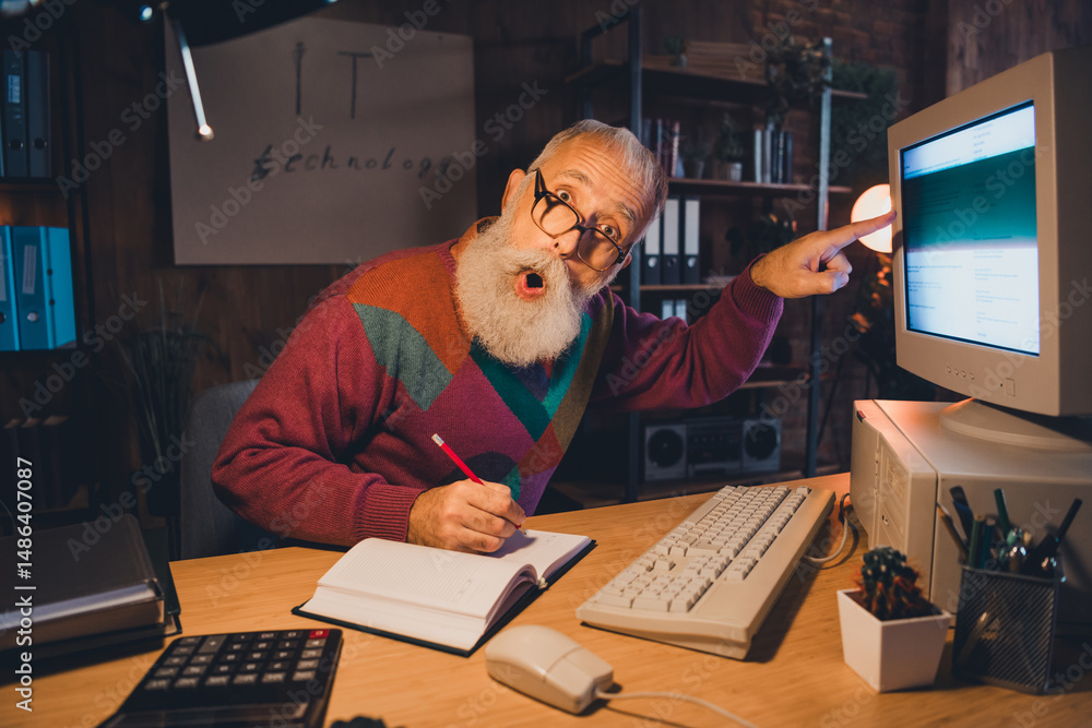 Poster elderly man teaching programming and computer use, working remotely in dimly lit home office