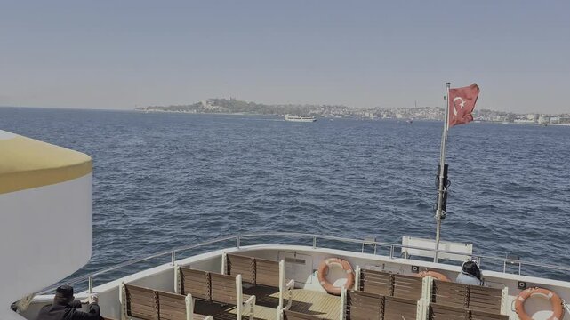 Images of historical Istanbul and the Bosphorus. The video includes tourists, ferries and flying birds. Hagia Sophia. Sultan Ahmet Mosque. Suleymaniye. Eminonu. Sirkeci. Horizontal video.