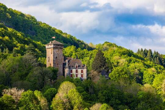 Pesteils Castle overlooking the village of Polminhac and the valley of the C&egrave;re in the Cantal