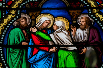 Fototapeta premium Stained glass (19th century) of Visitation of the Virgin Mary to her pregnant cousin Elizabeth.
