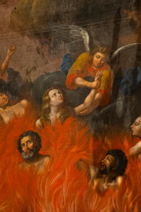 Painting (19th century) of Souls in purgatory fire waiting for the salvation of their souls.