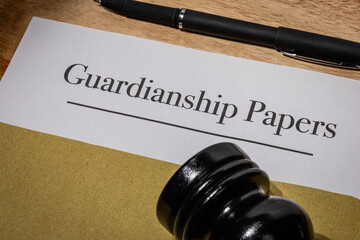 Guardianship Papers Document with Gavel on Desk – Legal Custody Arrangement Concept