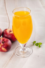 Vitamin beverage - peach juice glass