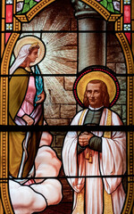 Obraz premium Stained glass (19th century) of St. John Mary Vianney the Holy priest of Ars.