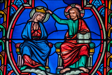Stained glass (19th century) of Coronation of the Virgin Mary, Mother of God, in heaven.