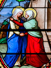 Obraz premium Stained glass (19th century) of Visitation of the Virgin Mary to her pregnant cousin Elizabeth.