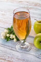 Apple yellow juice in the glass