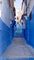 Alley with stairs in the medina, in Chefchaouen, Morocco