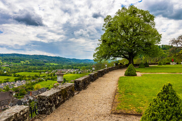 Terrace in front of the Pesteils Castle, in Polminhac, overlooking the valley of the Cère