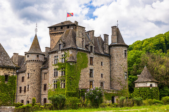 Facade of the Pesteils Castle in Polminhac in the Cantal