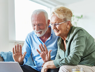 woman couple senior man happy internet love laptop call video communication online together mature active elderly retirement computer connection two using