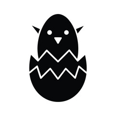 Cute chick hatching from cracked egg shell