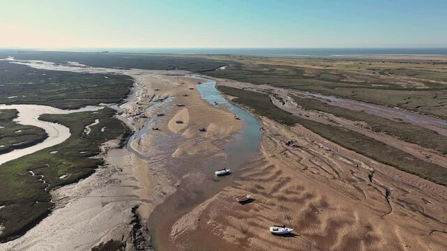 Brancaster Staithe Norfolk UK. The working villages of Brancaster and Brancaster Staithe are in an Area of Outstanding Natural Beauty on the north Norfolk coast. With a glorious beach.