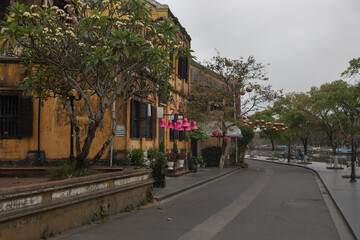 Colored decorated street in the Vietnamese city of Hoi An. Chinese paper lanterns are above the...