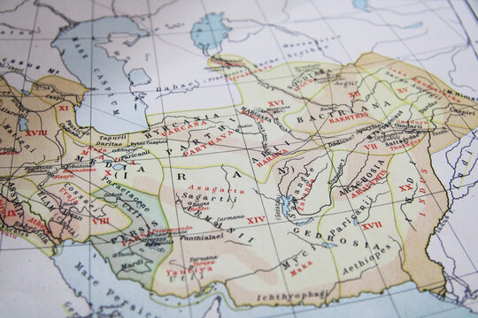 Colorful vintage map of ancient Persia, Media, Parthia, Bactria, and surrounding regions, featuring historical provinces, tribal names, and important rivers near the Caspian Sea and Indus Valley.