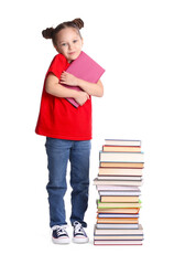 Cute girl with books on white background