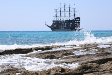 Beach ship sea. Old sailing ship. High quality photo