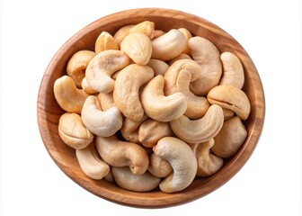 Delicious roasted cashews in a wooden bowl on a white background, top view