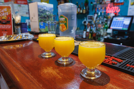 Madeira, Portugal - June 10, 2024: Traditional poncha drinks in a Bar Zeca in Santana, Madeira island