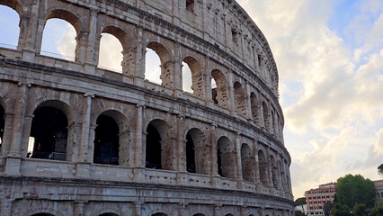 Obraz premium Rome Colosseum At Rome In Lazio Italy. Medieval Buildings. Downtown District. Rome Colosseum At Rome In Lazio Italy. Archaeological Park. Cultural Heritage. Italy Skyline.