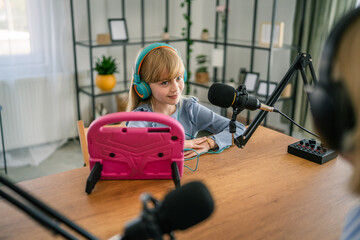 Granddaughter record podcast with grandmother at home studio
